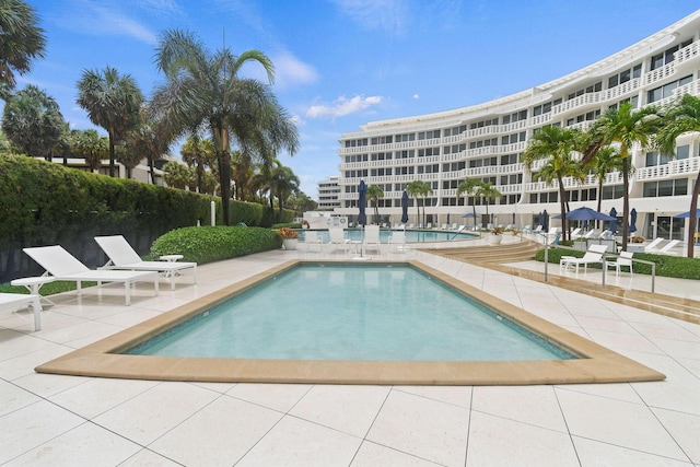 view of swimming pool featuring a patio