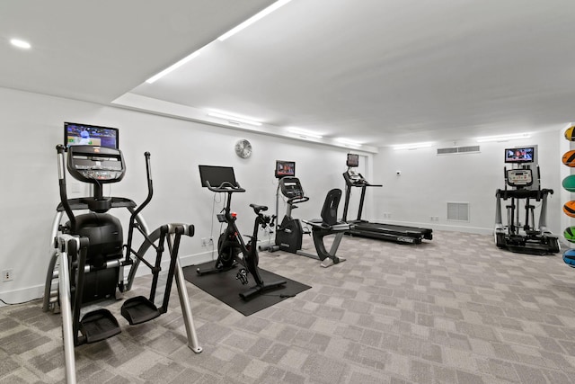 workout room with light colored carpet