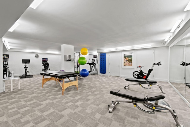 exercise area with light colored carpet