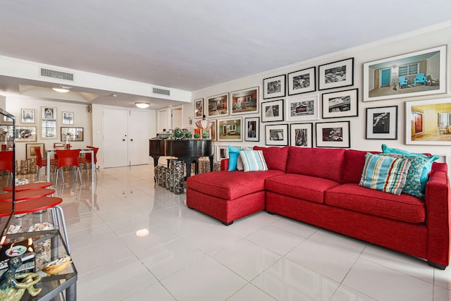 living room with light tile patterned flooring