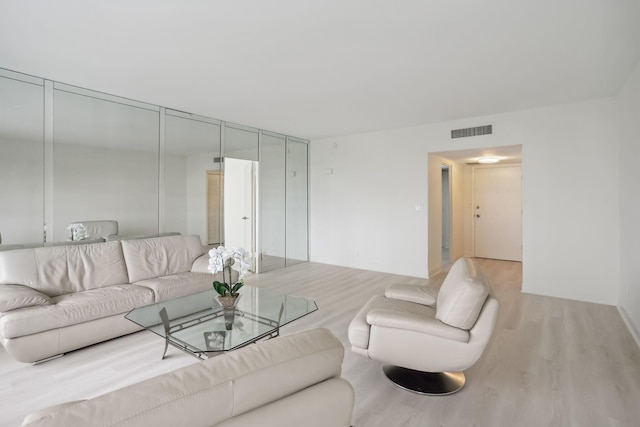 living room with light wood-type flooring