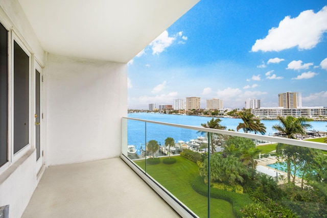 balcony featuring a water view