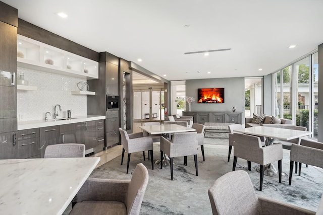 dining space featuring sink