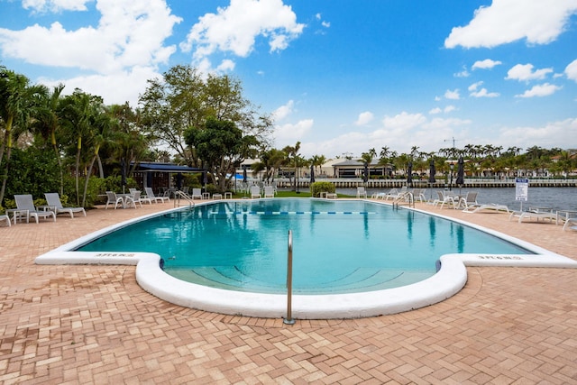 view of pool featuring a patio