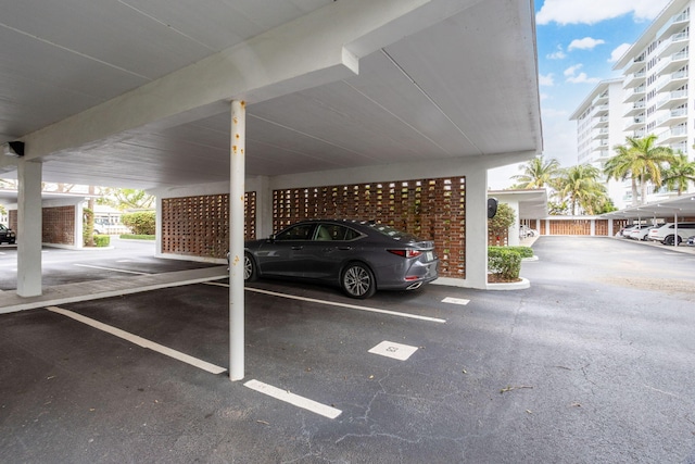 view of parking / parking lot with a carport