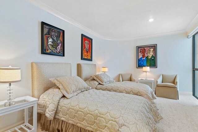 carpeted bedroom featuring ornamental molding