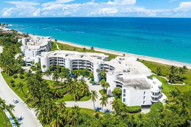 drone / aerial view with a view of the beach and a water view