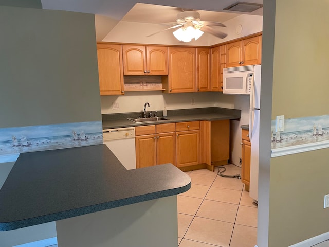 kitchen with kitchen peninsula, sink, light tile patterned floors, ceiling fan, and white appliances