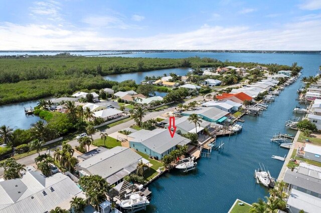 drone / aerial view featuring a water view