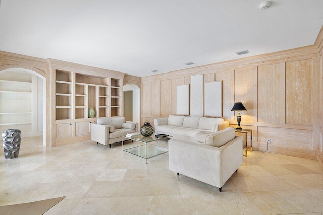 tiled living room with built in shelves