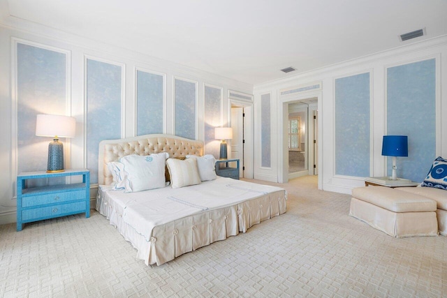 carpeted bedroom featuring ornamental molding