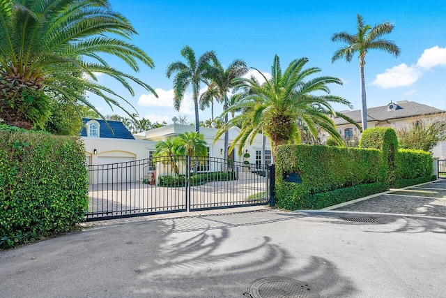 view of gate featuring a garage