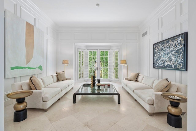 tiled living room featuring french doors and crown molding