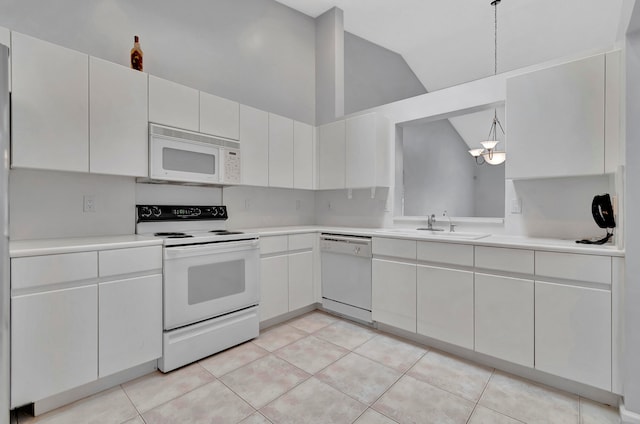 kitchen featuring white appliances, high vaulted ceiling, sink, light tile floors, and white cabinets