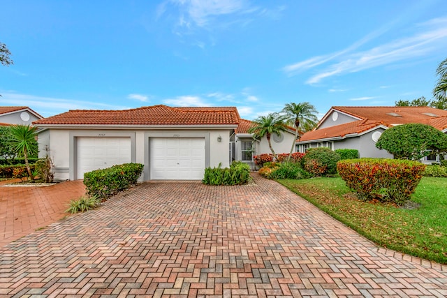 view of front of home with a garage