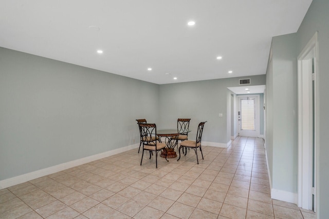 dining area featuring light tile patterned floors