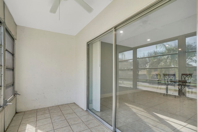 balcony featuring ceiling fan