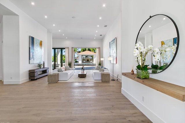 living room with light hardwood / wood-style flooring