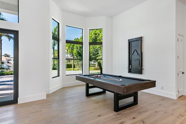 rec room featuring pool table, plenty of natural light, and light wood-type flooring