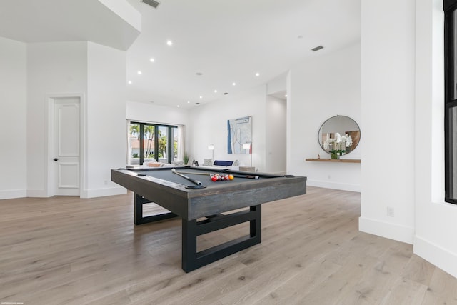 recreation room with light hardwood / wood-style flooring and billiards