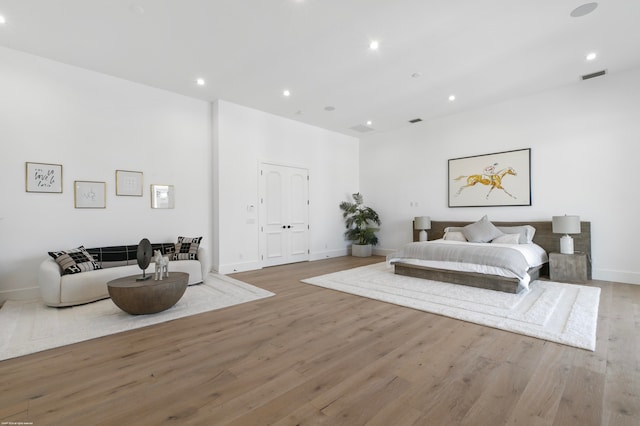 bedroom featuring wood-type flooring