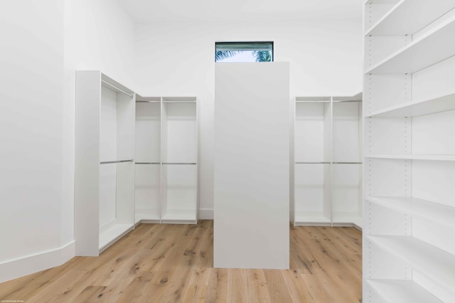 walk in closet featuring light wood-type flooring