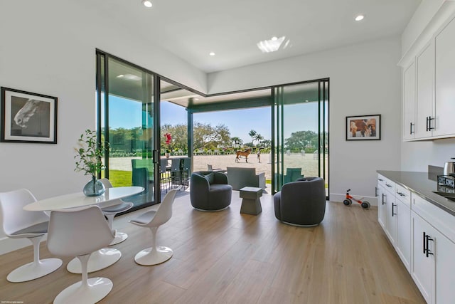 dining room with light wood-type flooring