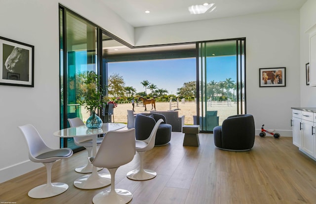 dining room with light wood-type flooring