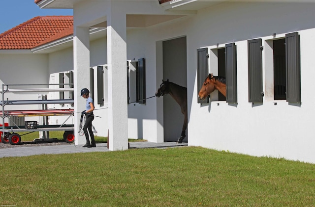 view of property exterior featuring a yard