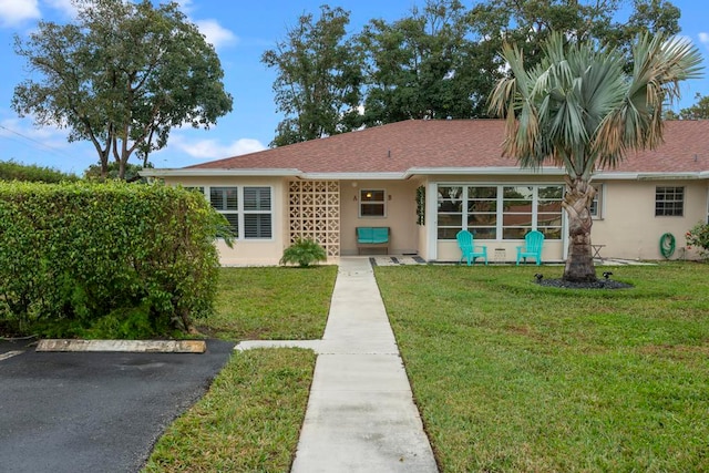 view of front of house with a front yard