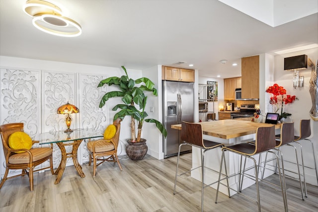 dining area featuring light hardwood / wood-style floors