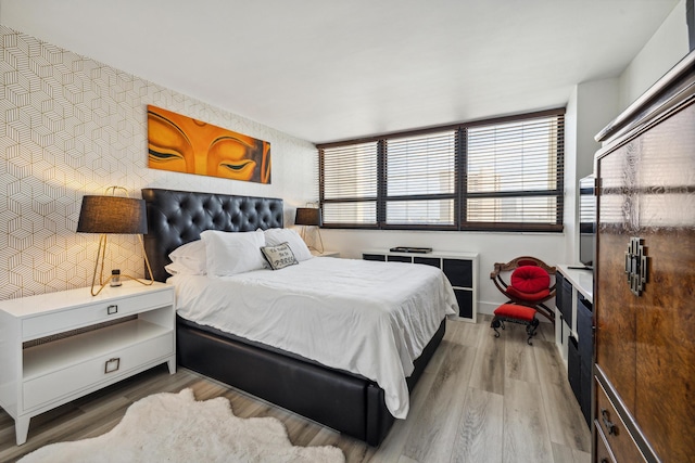 bedroom featuring wood-type flooring