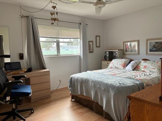 bedroom featuring ceiling fan and light hardwood / wood-style floors