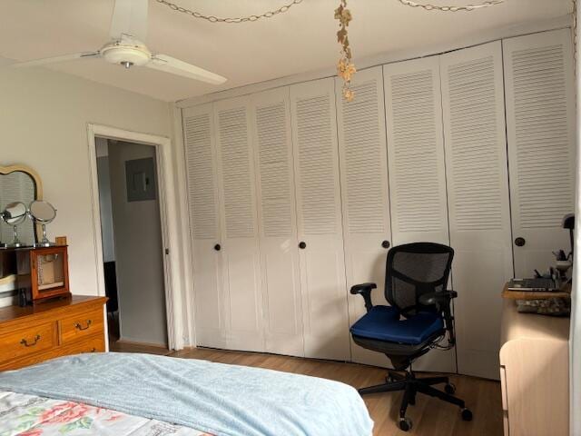 bedroom featuring ceiling fan and hardwood / wood-style floors