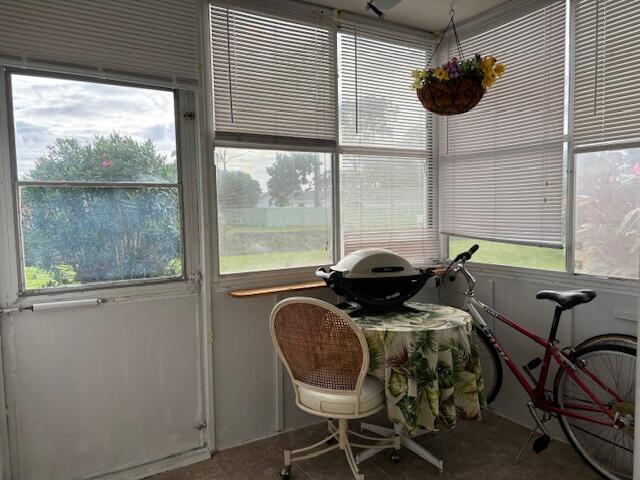 sunroom featuring plenty of natural light