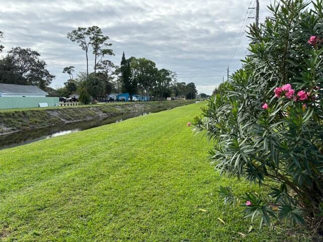 view of yard with a water view