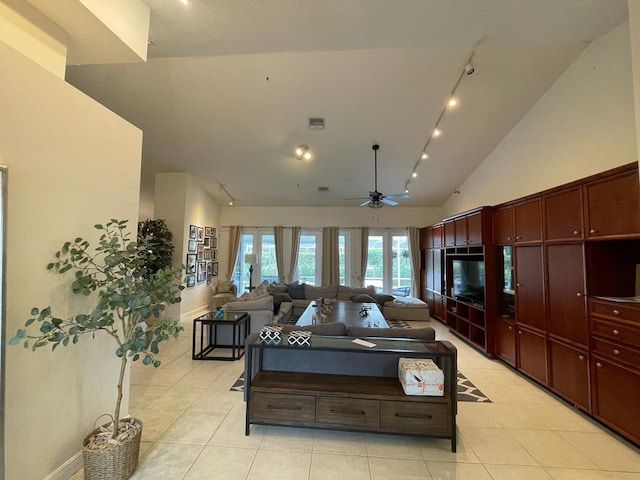 tiled bedroom featuring high vaulted ceiling and ceiling fan