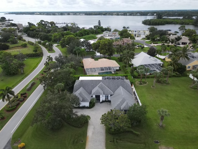 drone / aerial view with a water view