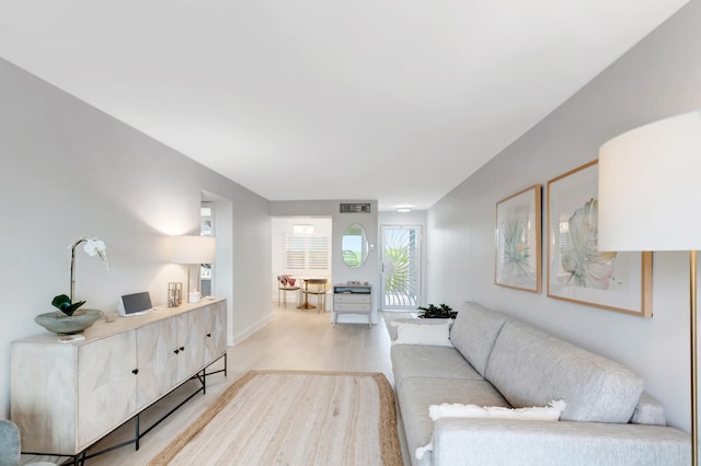 living room with light hardwood / wood-style flooring