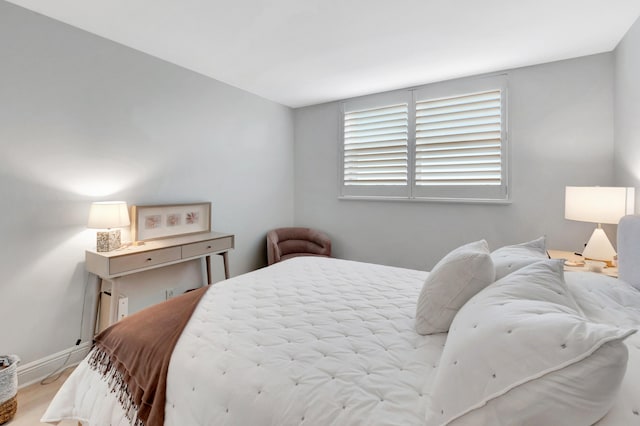 bedroom with light wood-type flooring