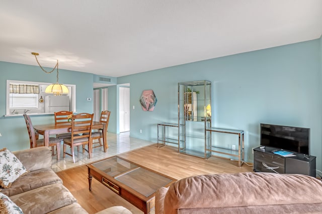 living room featuring light wood-type flooring