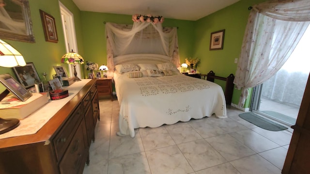 22 Northampton A, West Palm Beach, FL 33417 - bedroom with light tile patterned floors