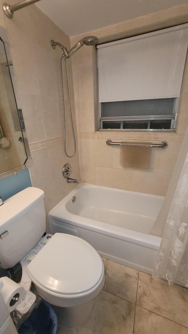 22 Northampton A, West Palm Beach, FL 33417 - bathroom with shower / tub combo, toilet, and tile patterned floors