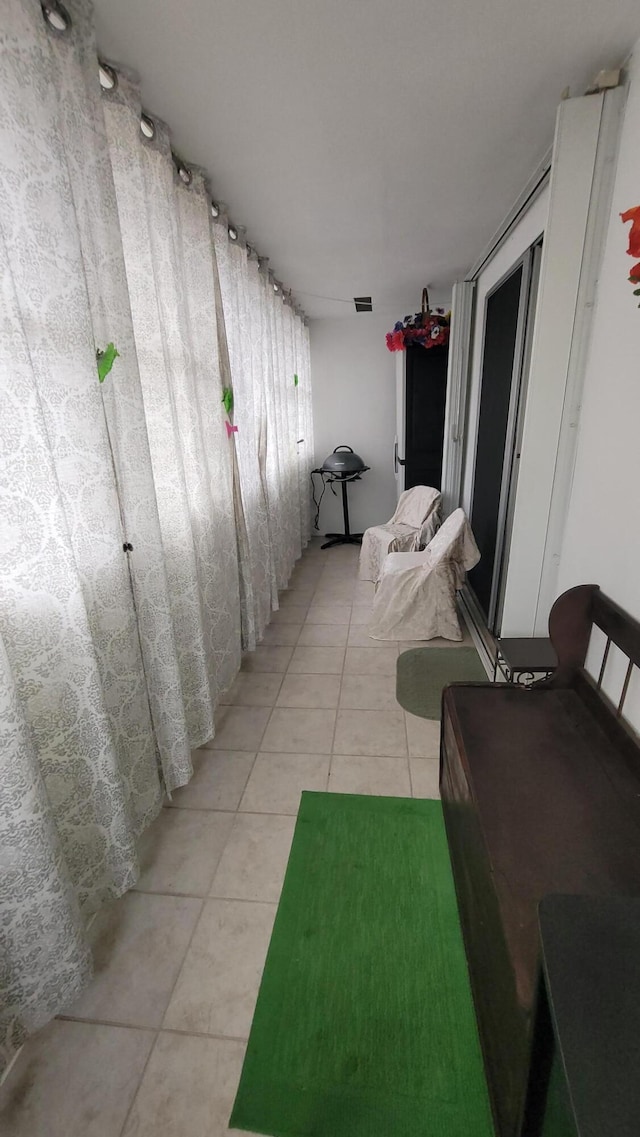 22 Northampton A, West Palm Beach, FL 33417 - hallway featuring light tile patterned flooring