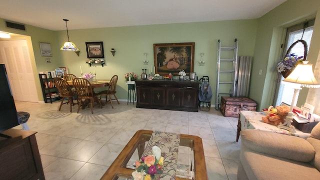 living room featuring light tile patterned floors