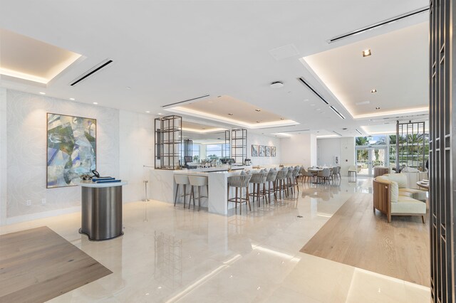 dining room with a tray ceiling