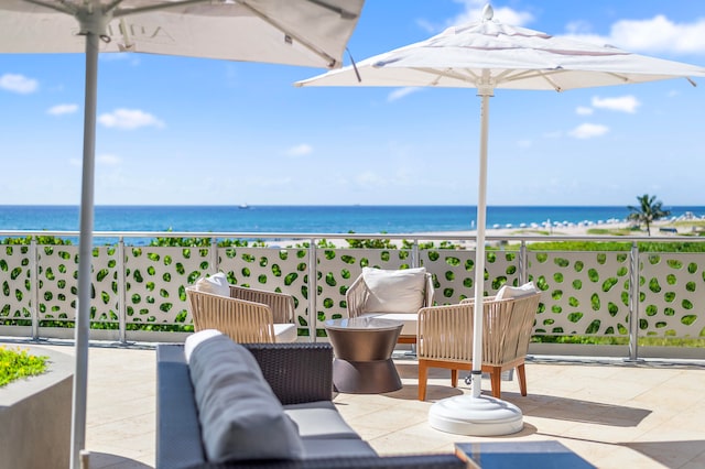 balcony featuring a water view, a patio, and an outdoor hangout area