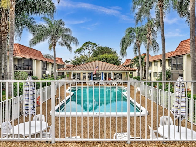 view of swimming pool with a patio