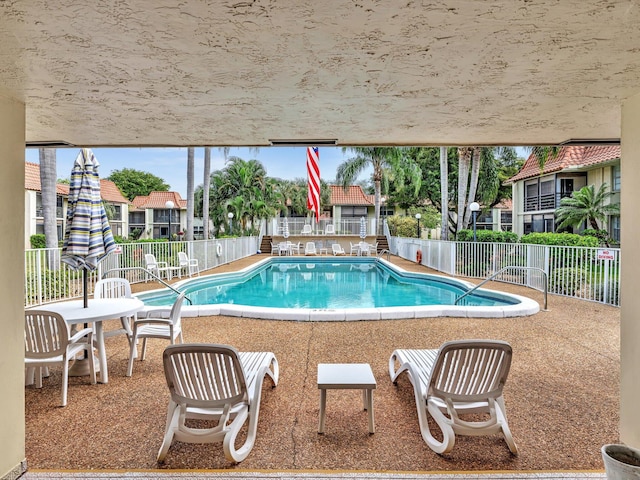 view of pool with a patio