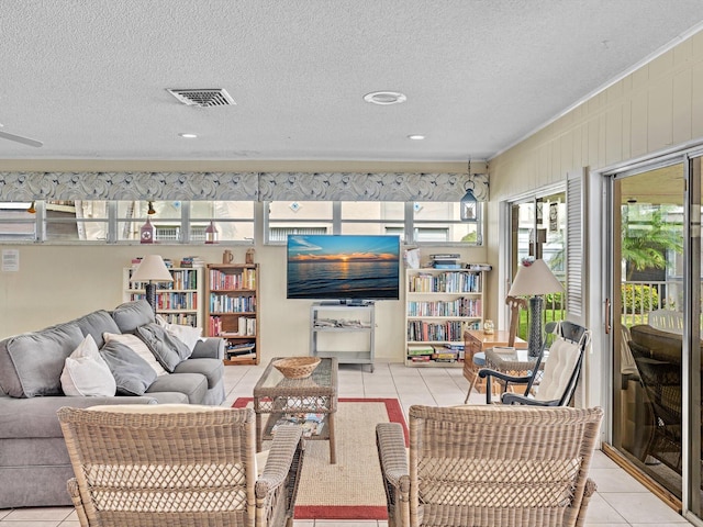 tiled living room with a textured ceiling